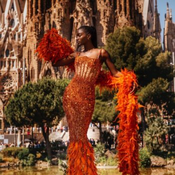 Orange Adorned Dress with Feathered Cape